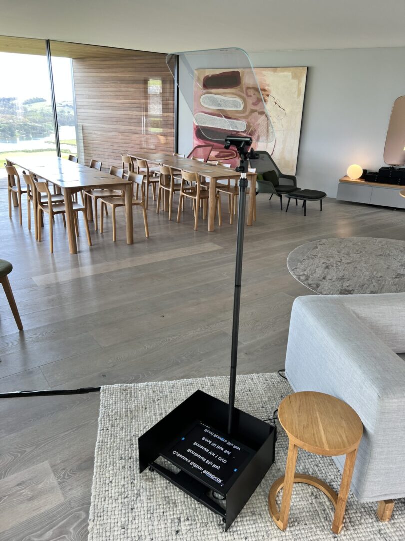 A room with a table and chairs in it